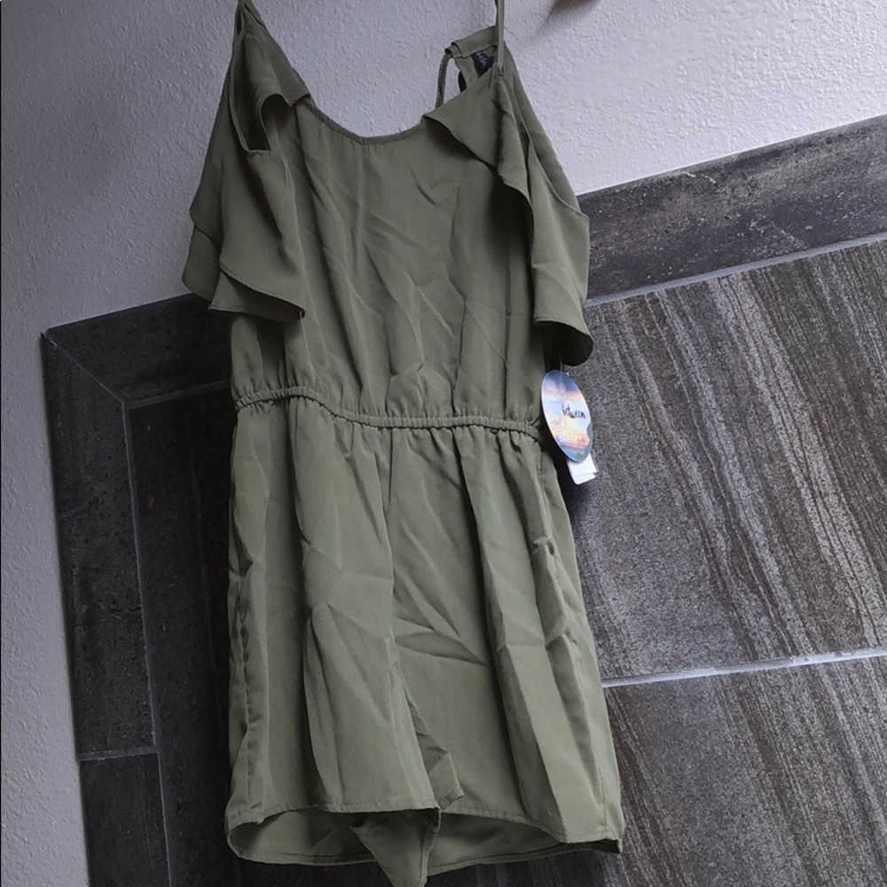 A cutespaghetti strap and off the shoulder romper